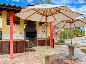 Casas com 2 ou 3 suítes no Residencial Jerusalem 2,frente mar em Coroa Vermelha (BA), condomíonio com piscina, sauna e portaria 24hrs atravessou a rua está no mar.