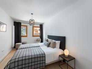 Neuf 3P avec parking et services inclus à Megève - FR-1-569-70