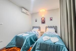 Casa espaçosa, 3 quartos com ar + 2 vagas