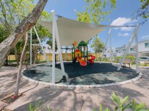 Cómodo alojamiento familiar al sur de Cancún con 2 habitaciones y cocina