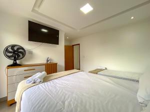 Casa Individual com 2 suítes, cozinha completa, Internet privativa 300MBPS, região bem sossegada com comercios diversos ao redor