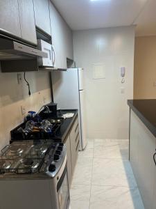 Novo apartamento Praia do Morro condomínio Solar do Porto