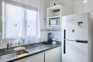 PS6: Casa Bem Localizada, com Ar e Super Completa!