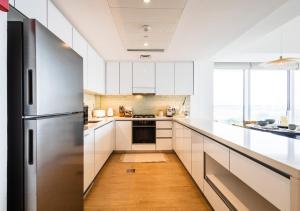 Stylish 2BR Escape in Mayan with Beach Access