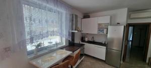 Ubytovanie v centre v apartmánovom dome ENZO s garážovým státím