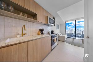 Downtown 1-BD Condo with City Views