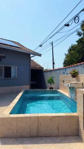 Casa com piscina climatizada em Itanhaém!