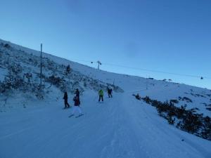 Zrub Kriváň Drevená chata s výhľadom na Tatry