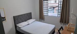 Quarto central em ótima localização