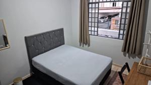 Quarto central em ótima localização