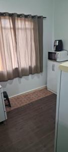 Quarto central em ótima localização