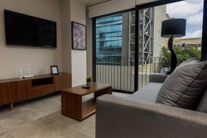 Departamento con cama queen, alberca, gimnasio y coworking, a minutos de Expo Guadalajara