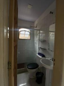 Apartamento térreo em casa à beira-mar