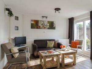 Holiday home in Nes with swimming pool