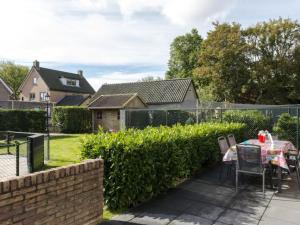 Holiday home in Nes with swimming pool