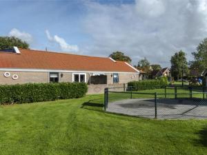 Holiday home in Nes with swimming pool