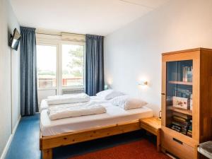 Holiday apartment in Buren with swimming pool