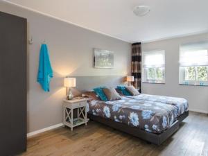 Holiday home in Nes with swimming pool