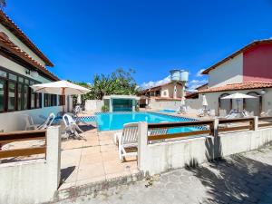 Casas com 2 ou 3 suítes (todas com ar split), com internet privativa 300MBPSno Residencial Nazareth, localizado a aproximadamente 80m da praia de Taperapuã (Arena Axé moi), com piscina, sauna, portaria 24hrs