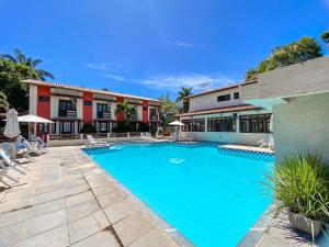 Casas com 2 ou 3 suítes (todas com ar split), com internet privativa 300MBPSno Residencial Nazareth, localizado a aproximadamente 80m da praia de Taperapuã (Arena Axé moi), com piscina, sauna, portaria 24hrs