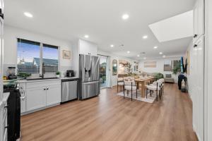 Entire Private Home with 4Bedrooms 2Bathrooms, Hot Tub, King Bed, Garage, Gated Backyard, Available Now