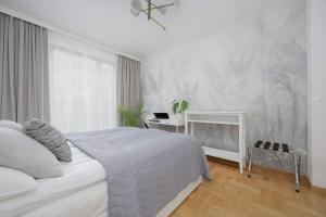 Teodorowicza Elegant Apartment with Parking in Warsaw by Noclegi Renters