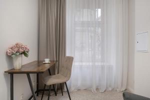 Beige Apartment in Wrocław Center with Home Office by Noclegi Renters