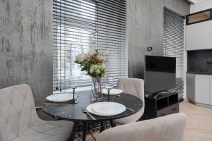 Beige Apartment in Wrocław Center with Home Office by Noclegi Renters