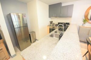 Luxury 120sqm suite Uptown BGC with spectacular balcony view