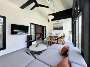 3BR Tropical Villa with Pool & Lush Garden Oasis, 4 minutes to the beach