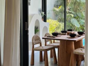 3BR Tropical Villa with Pool & Lush Garden Oasis, 4 minutes to the beach