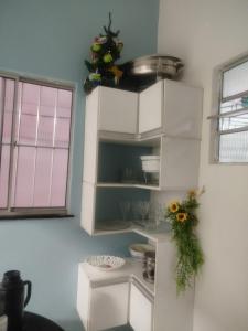 Casa com três quartos e carro a disposição