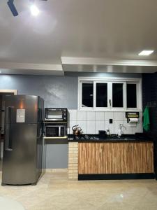 Studio in Joinville, piscina - Pet Friendly