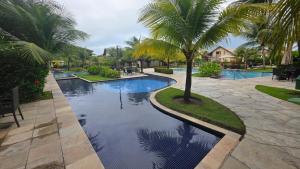 Nui Muro Alto Pé na Areia by La Playa