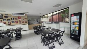 Nui Muro Alto Pé na Areia by La Playa