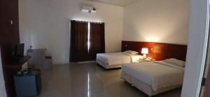 Edotel Saptra SMKN 1 PUJUT