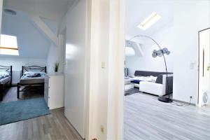 Light-Filled 2-Bedroom Attic Flat with Air Conditioning