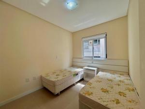 Excelente apto 3 dormitórios em Bombas SC