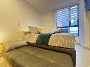 Apartaestudio en Chapinero con gimnasio coworking rooftop piscina climatizada sauna turco bbq y chimenea