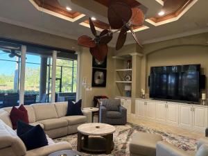 Expansive 1-Story Home on Twin Eagles Talon Golf Course Ideal for Family Gatherings