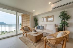 Serene and Modern Beachfront Condo with Ocean Views