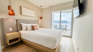 Serene and Modern Beachfront Condo with Ocean Views