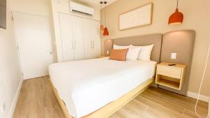 Serene and Modern Beachfront Condo with Ocean Views