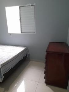 Casa com piscina lado praia