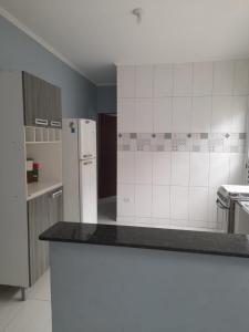 Casa com piscina lado praia