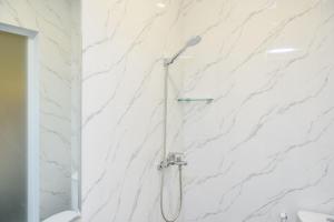 RedDoorz Plus Syariah at Lotus Residence