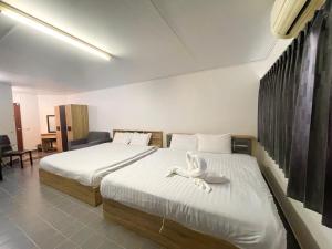 ห้องพักรายวันเมืองทองธานีตึกc5 (คุณแอ๊ด)