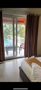 The VARANDAH LOUNGE 2BHK PRIVATE POOL VILLA VAGAMON