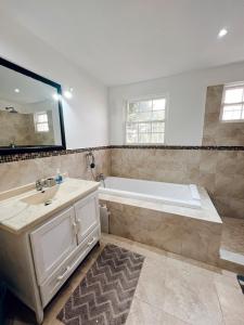 Oistins 2BR Condo with Pool & Patio, Walk to Miami Beach