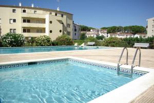 Apartamento a 100 MTS playa,con dos piscinas - Ubytování bez kategorie ve městě L' Escala
